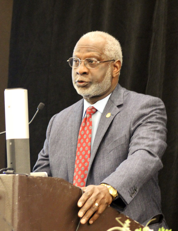 satcher at podium photoshopped